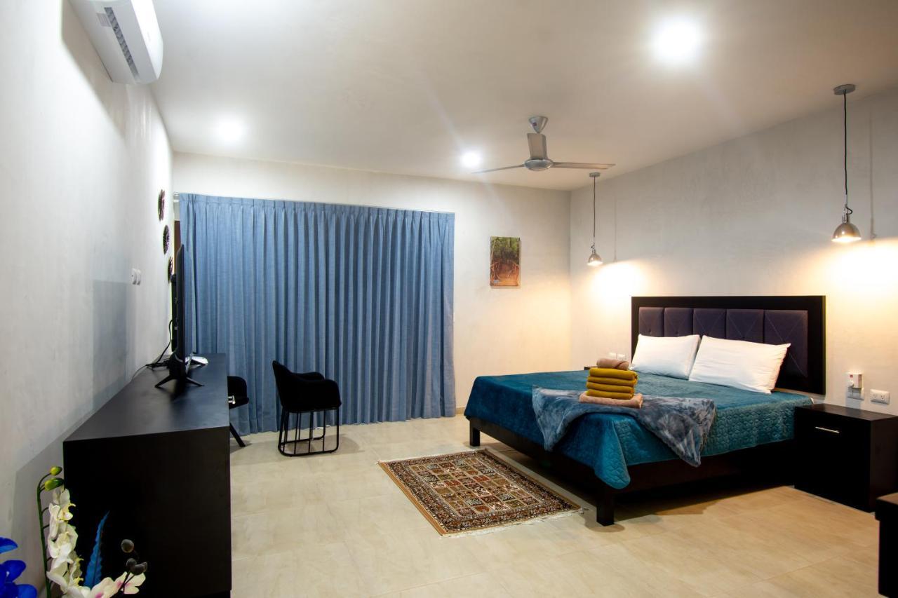 Hotel Casa Tortuga Tulum - Cenotes Park Inclusive Ngoại thất bức ảnh A bedroom in a hotel